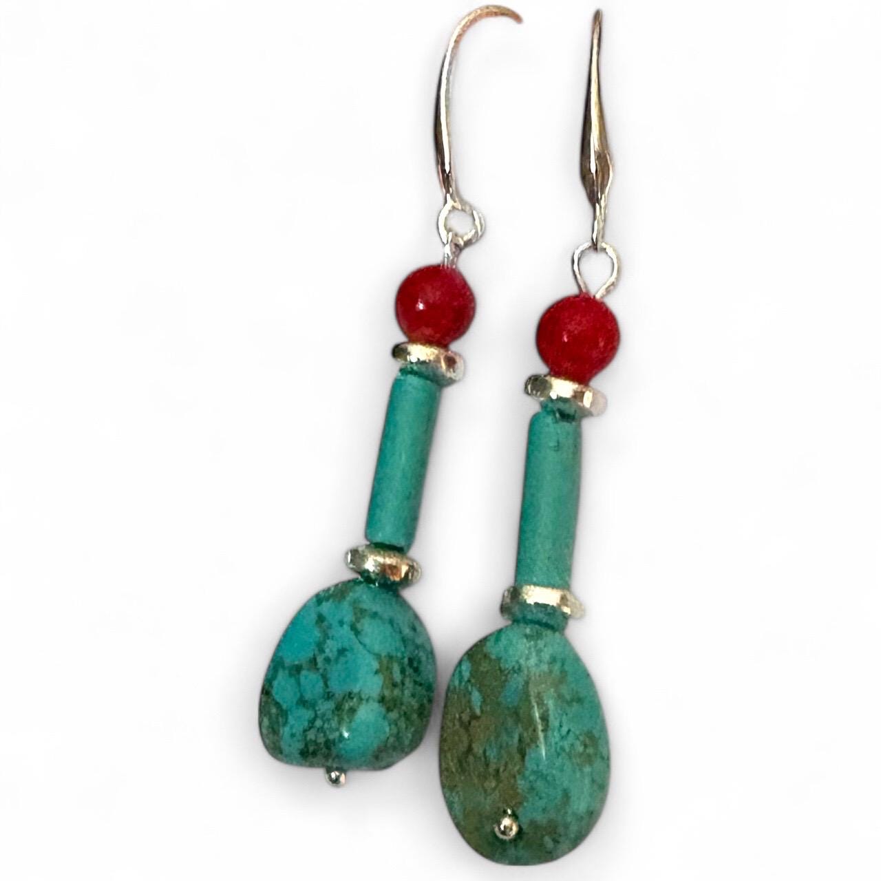 Handmade turquoise and coral gemstone drop earrings with silver ear wire closure. Features natural turquoise teardrop stones paired with round coral   and silver-plated accents. Lightweight boho style dangle earrings, perfect for everyday wear, gifts, or special occasions