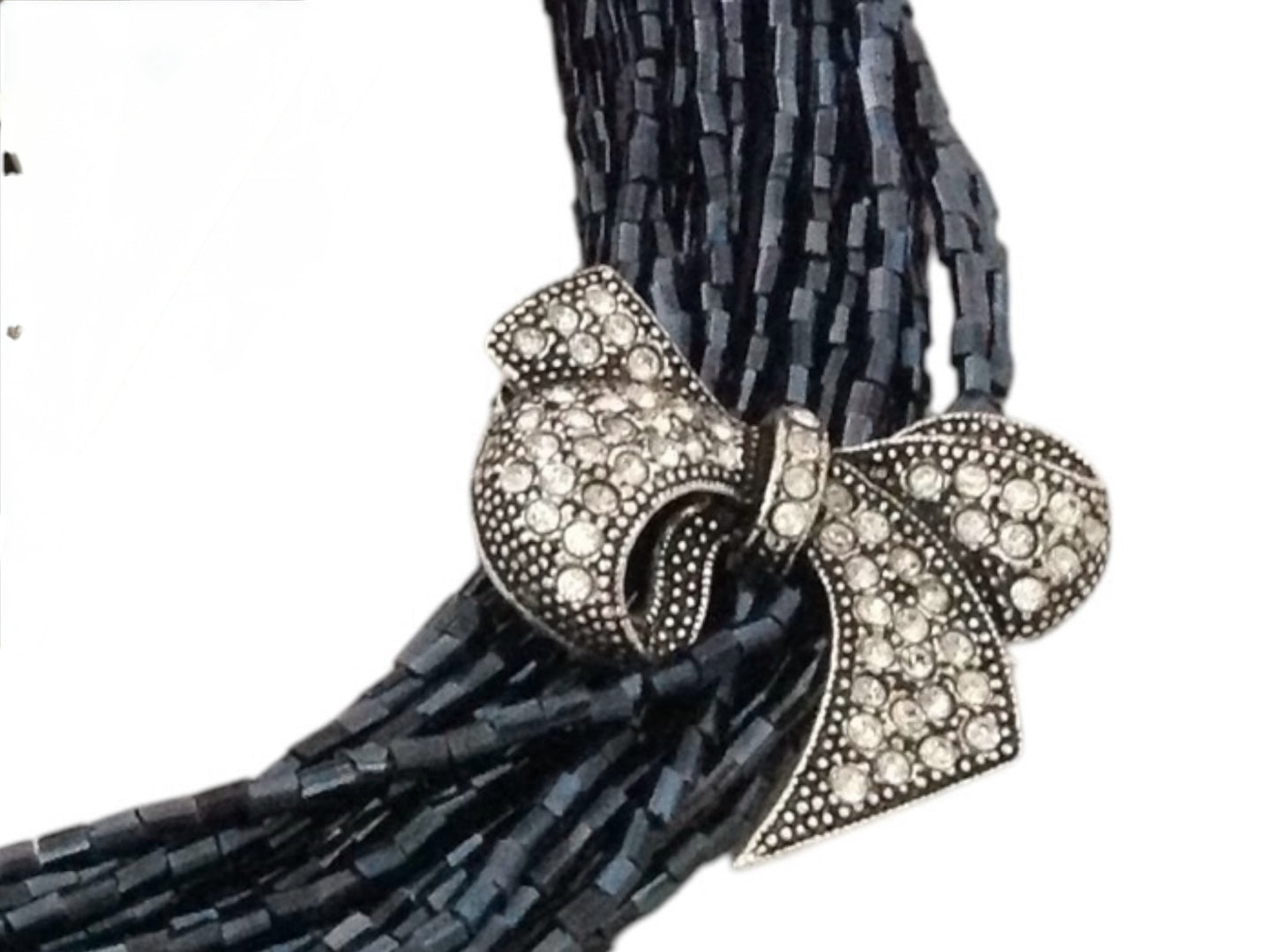 Semra Ascioglu multi-strand midnight-blue beaded necklace with a vintage-inspired crystal-encrusted bow charm
