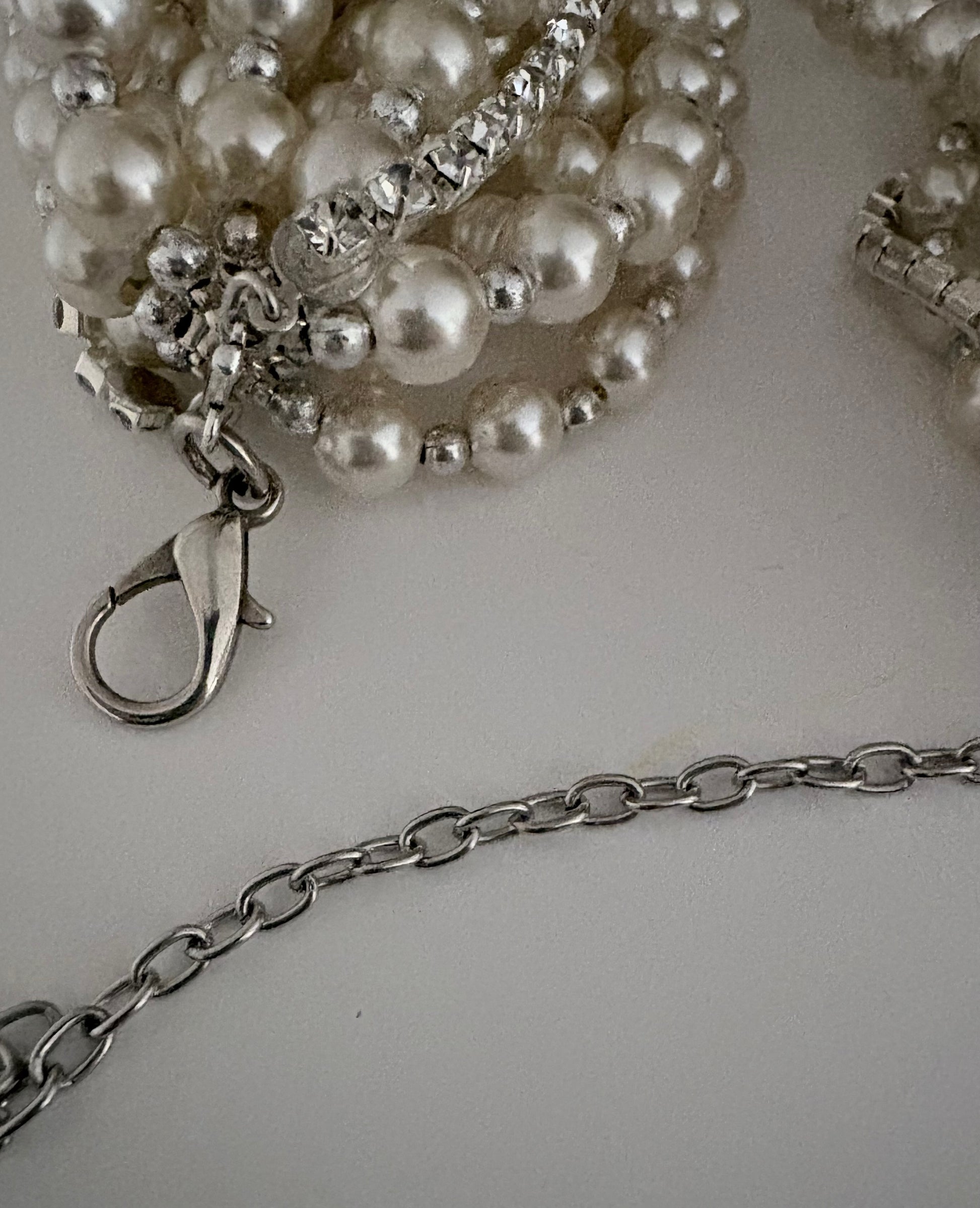 Semra Ascioglu multi strand pearl necklace with crystal accents and silver tone lobster clasp closure
