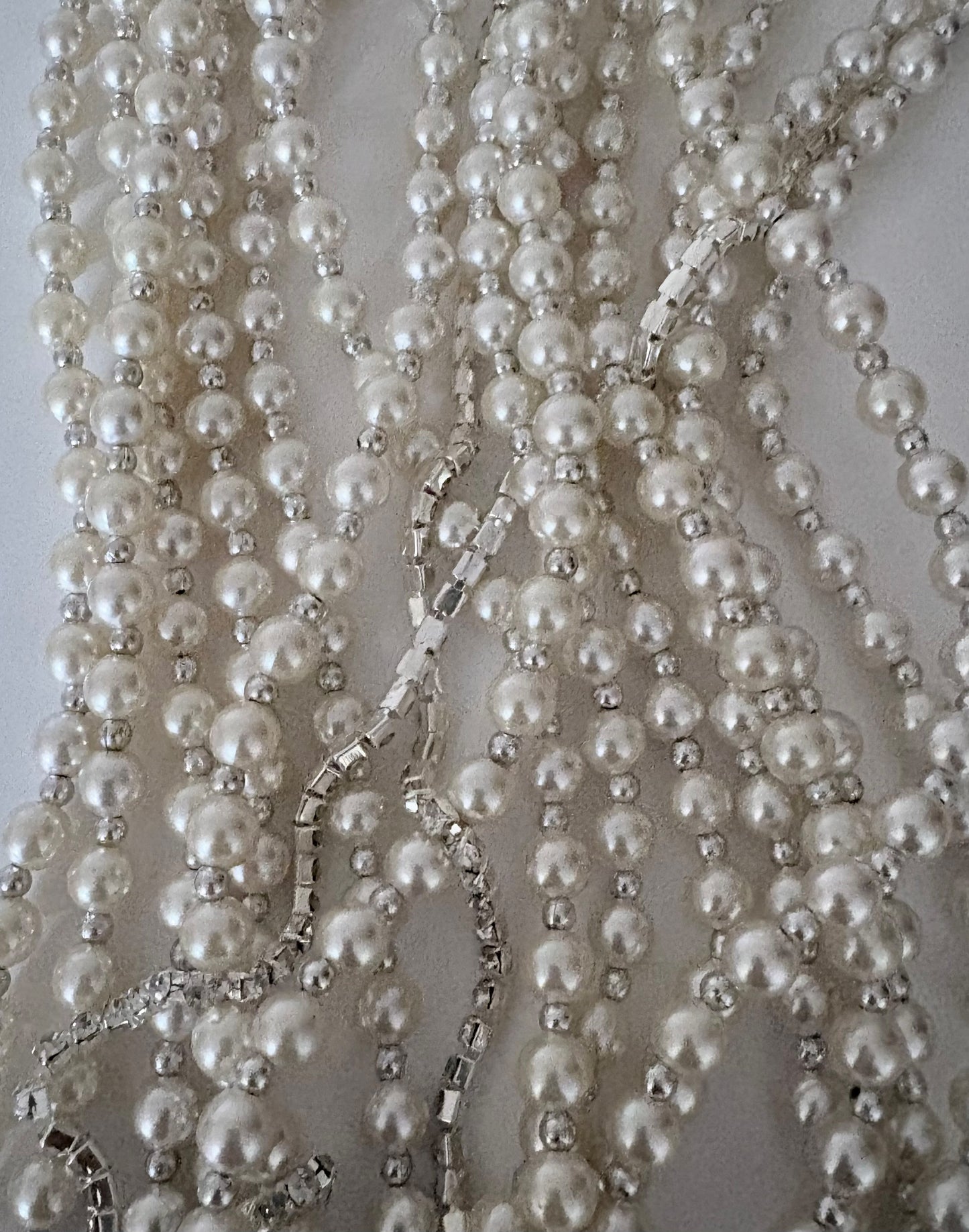Semra Ascioglu multi-strand pearl statement necklace with shimmering crystal accents for elegant evening wear.
